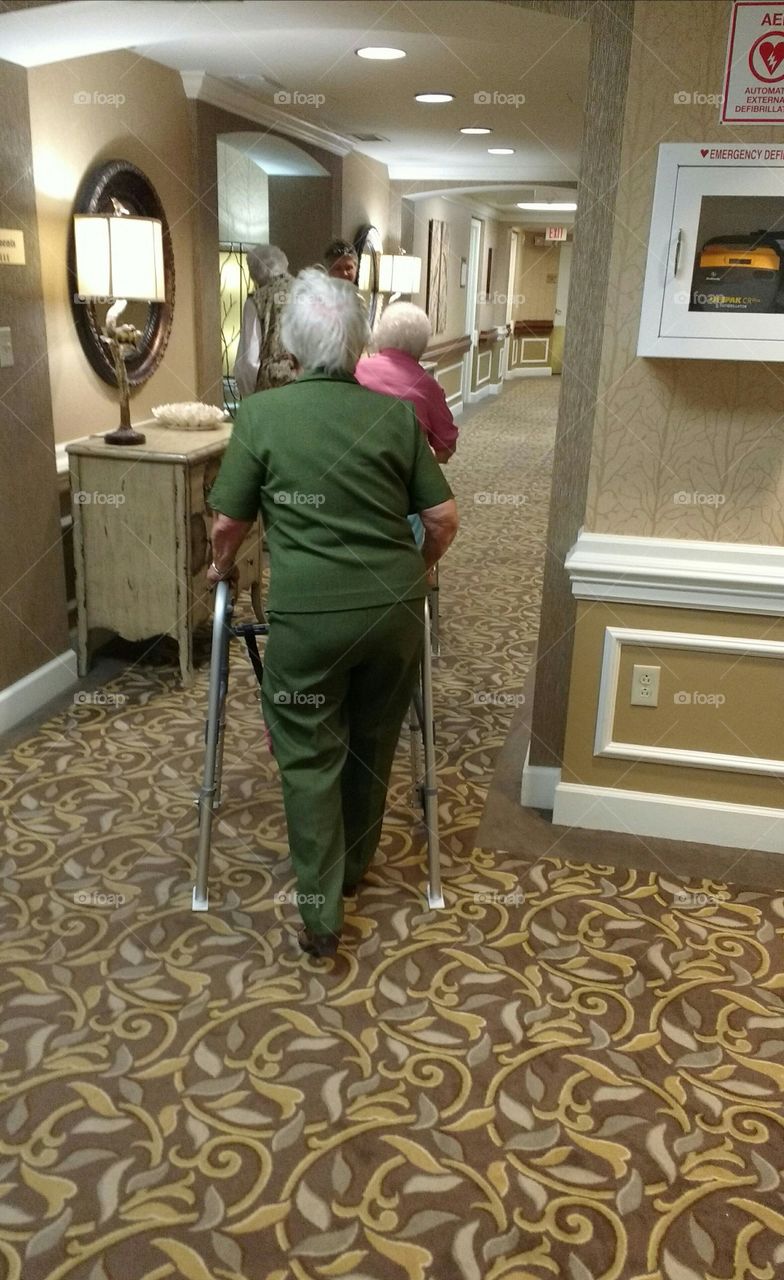 Elderly people from Behind walking to Rooms