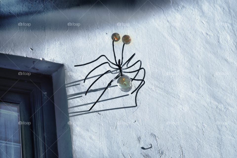 spider decoration on building