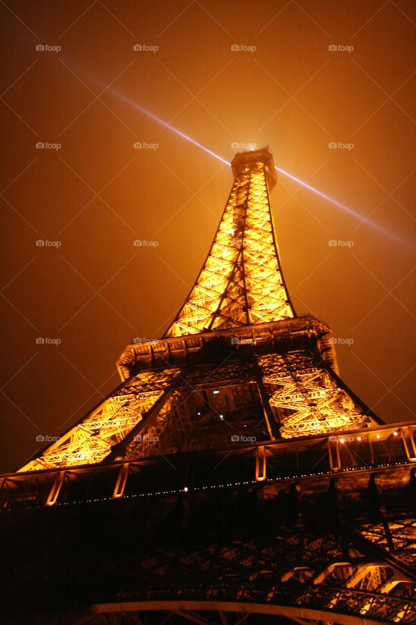 Eiffel Tower at night . Glowing, lit up Eiffel Tower in Paris