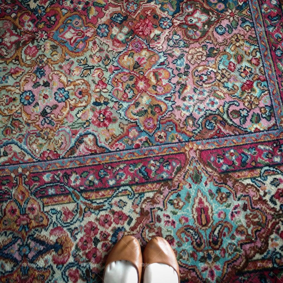 Feet on Intricate Carpet