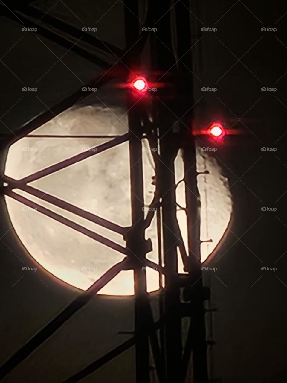 moon through a tower.