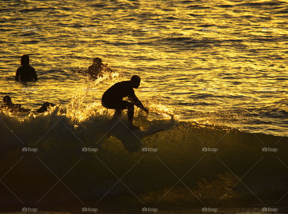 summer sunset surfing