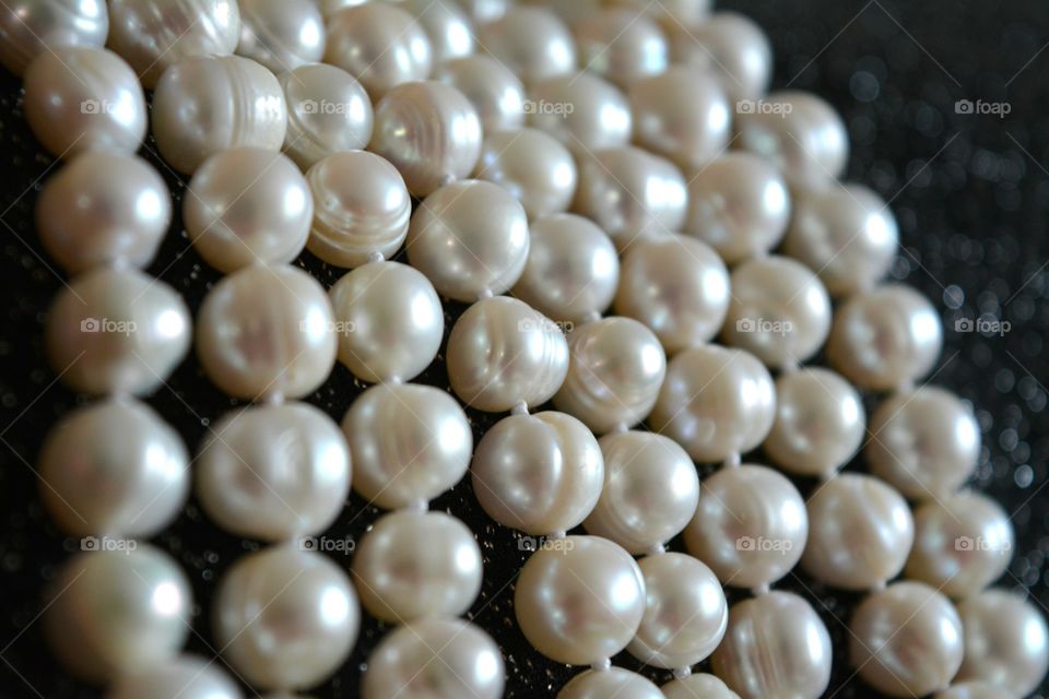 Close-up of pearl jewelry