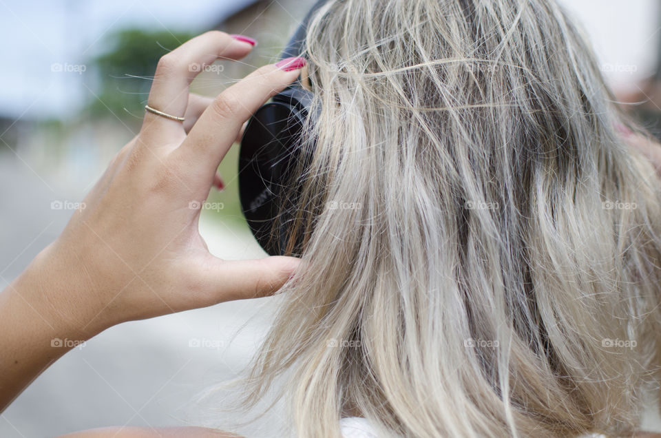 Woman listening to music on headphone