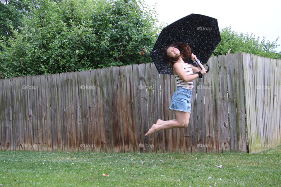 Girl with Totes umbrella