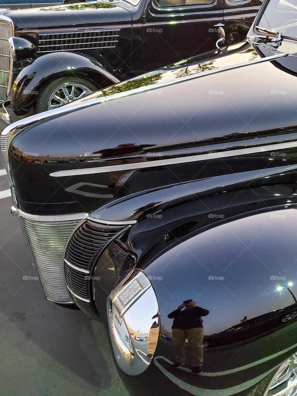 Classic cars from the 1930's with shiny black paint