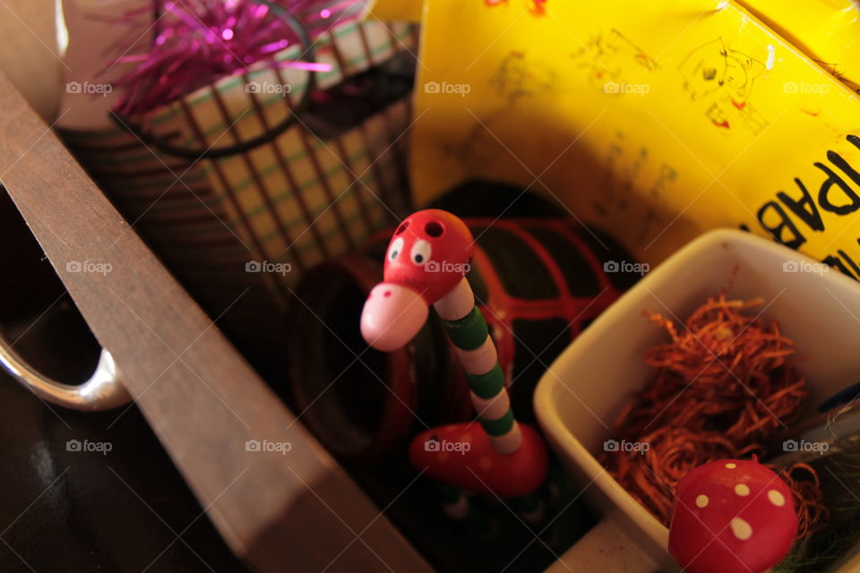 Toys, children, games, toy, bright igiushki, wooden toy, colored toys, for children, old toys, forgotten toys, colored toy, children's games, for children, a small toy, old things, rubbish, trash in a box, a box with objects, closet, old books, dusty