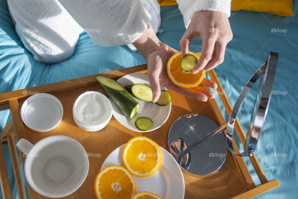 Man eating breakfast with vegetables and fruits