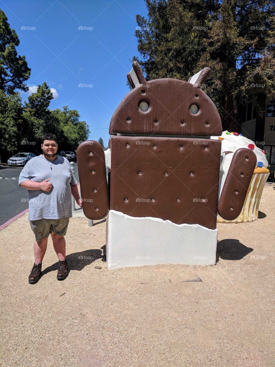 At the Googleplex, standing near an Android update, Ice cream sandwich.