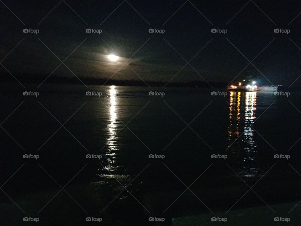 Moon reflection and Tug Boat lights