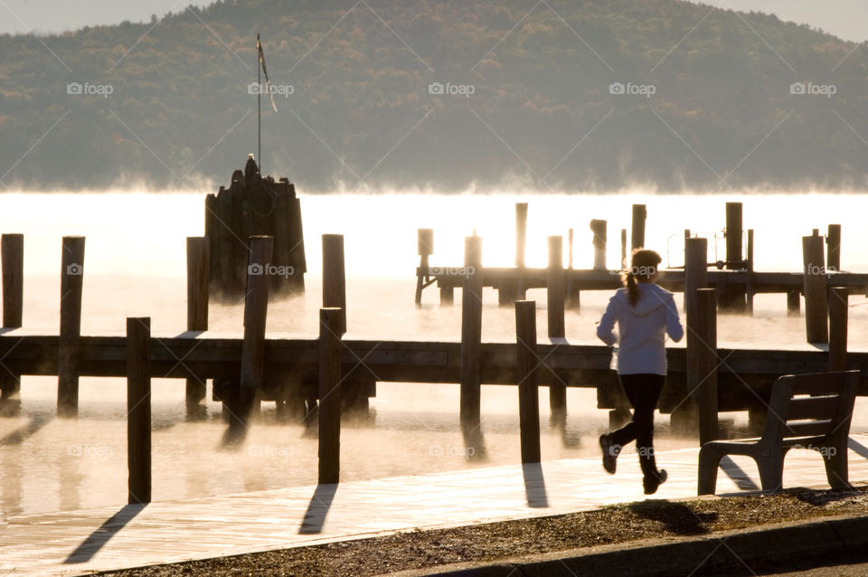 Running on the pier at sunrise