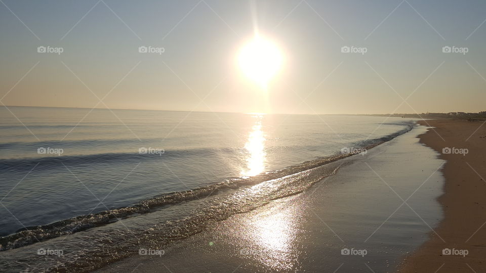 Sun rise on the Chesapeake Bay in Norfolk, 6
