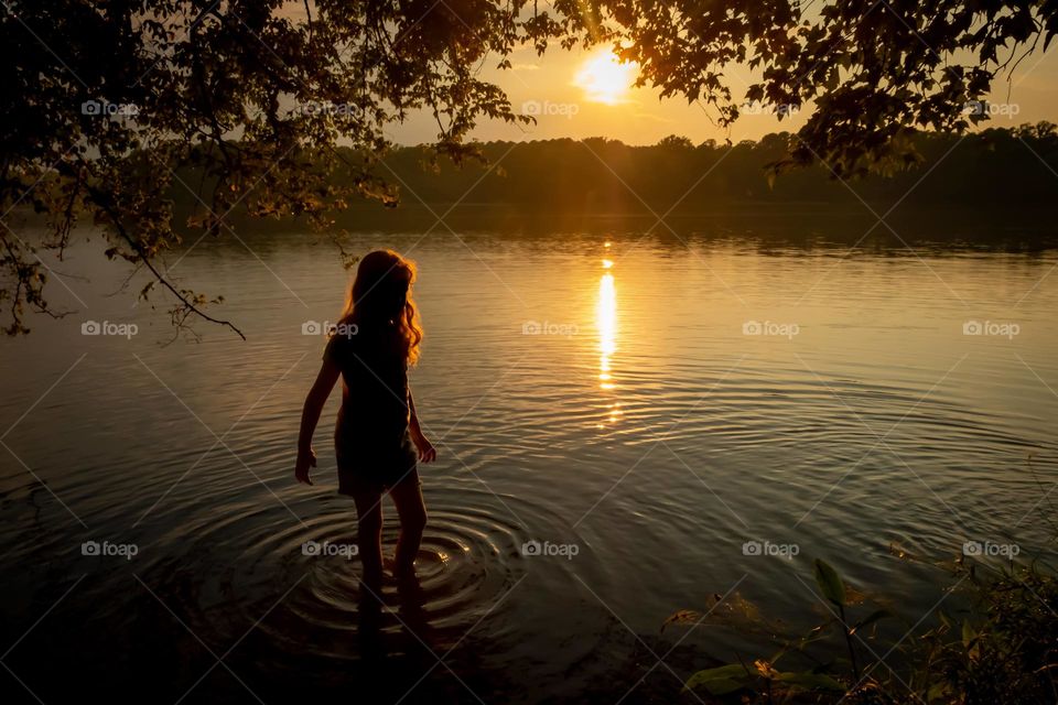 Golden sun, golden sky, golden haze, golden leaves, golden reflection, golden ripples, golden hair...Golden Hour. Lake Benson Park, Garner, North Carolina. 