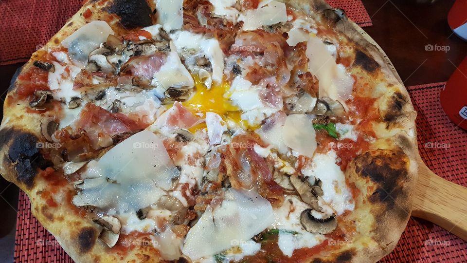 italian pizza with some egg