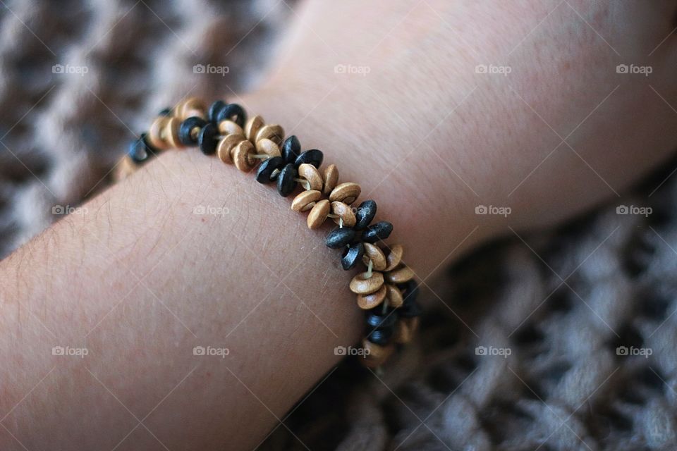 Black and beige flower bracelet