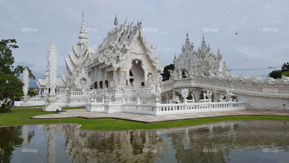 white temple in chiang rai is an unconventional Buddhist and hinduist contemporary temple the construction started in 1997 in the north of thailand very close to the golden triangle