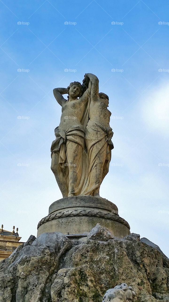 Ladies in Place d la Comedie. It is in Montpellier, France. 3 ladies