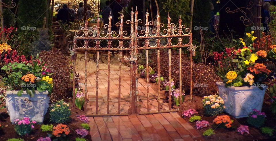 Beautiful metal fence with flowers 