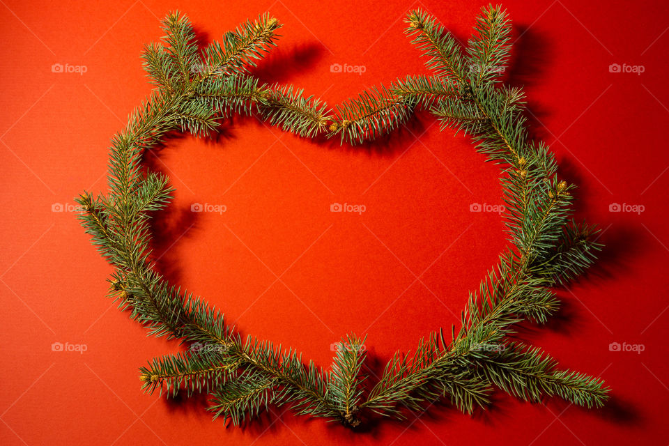 Heart shaped christmas tree branches. Creative christmas concept