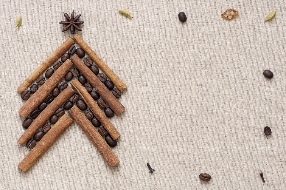 Christmas tree made of coffee beans and cinnamon