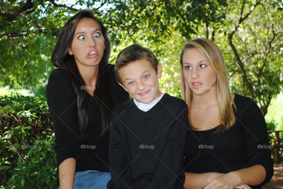 Siblings making faces