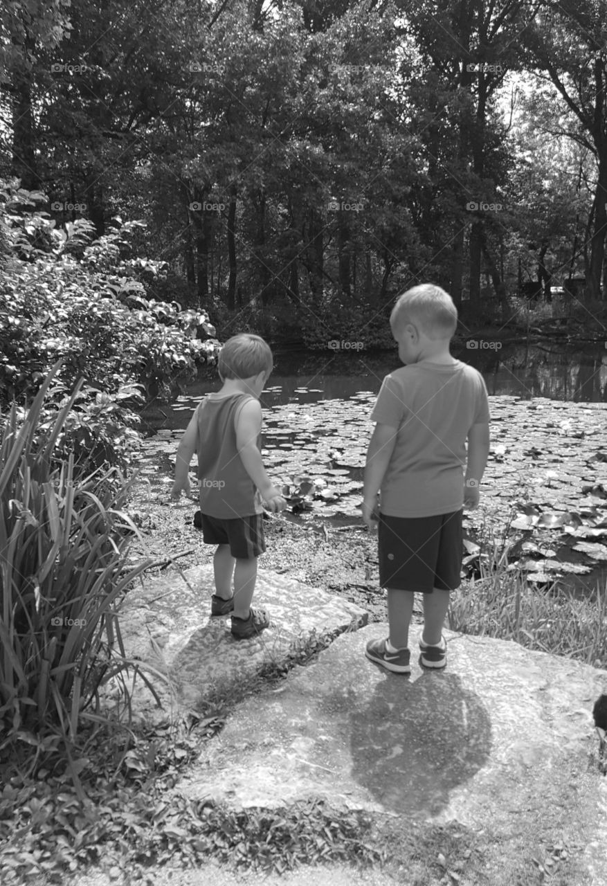 black and white boys enjoying nature