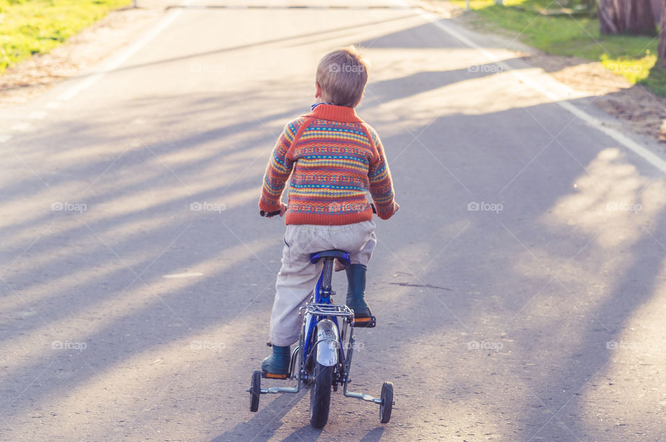 Little boy on the bike