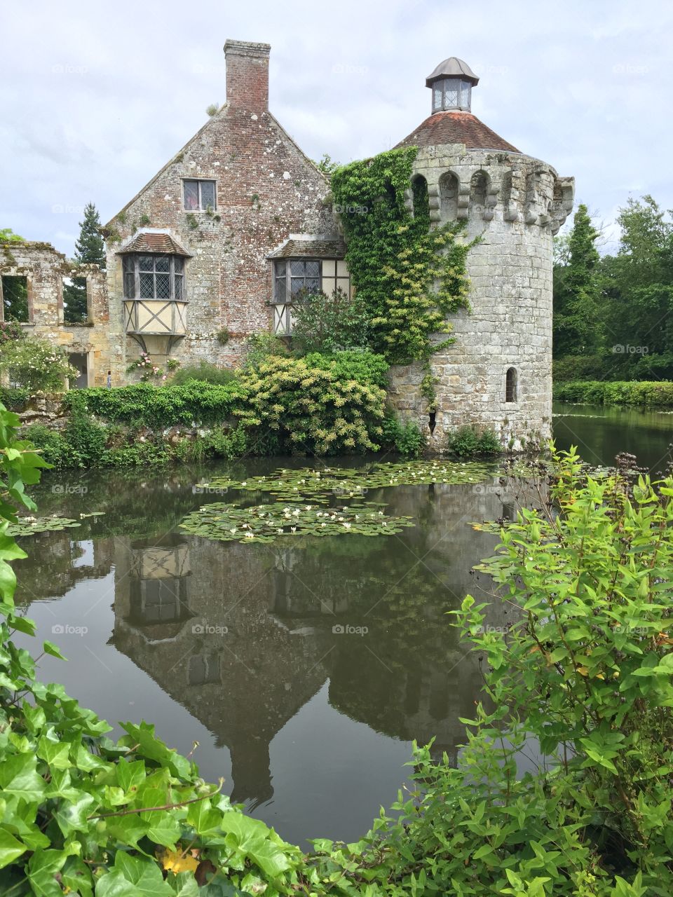Castle house on lake reflection