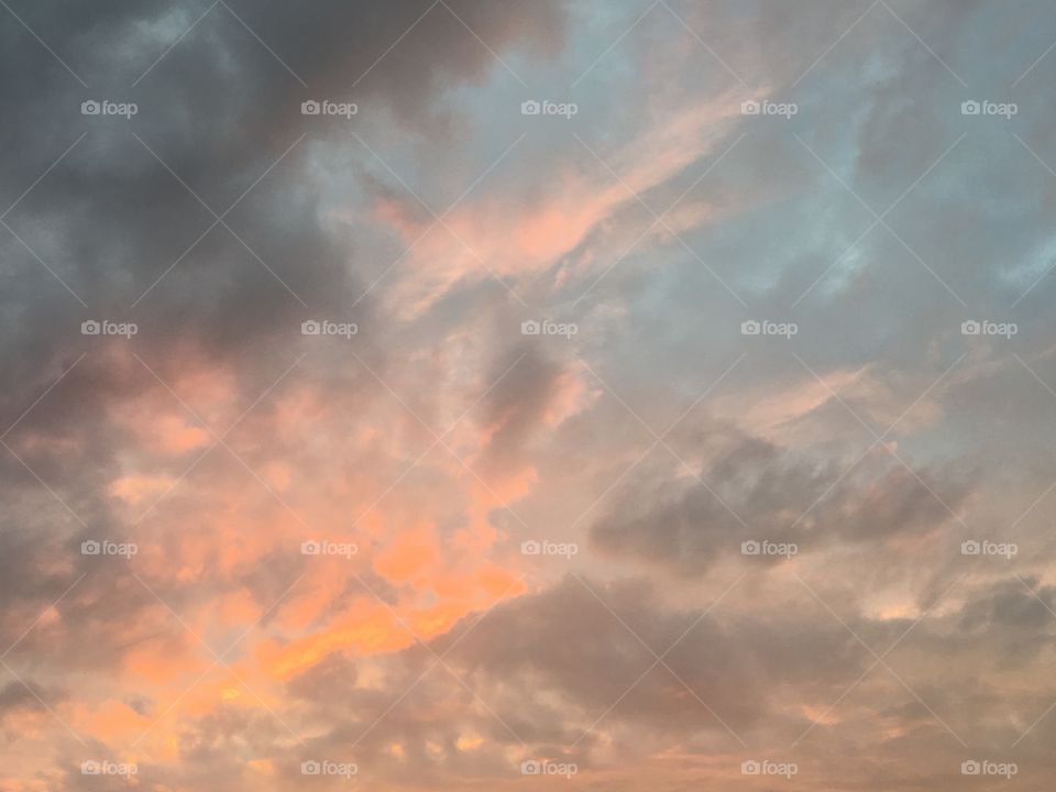 Clouds in grey,pink and light blue 
