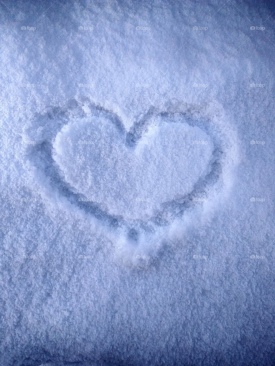 Valentines heart on snow. Love winter. Love snow.