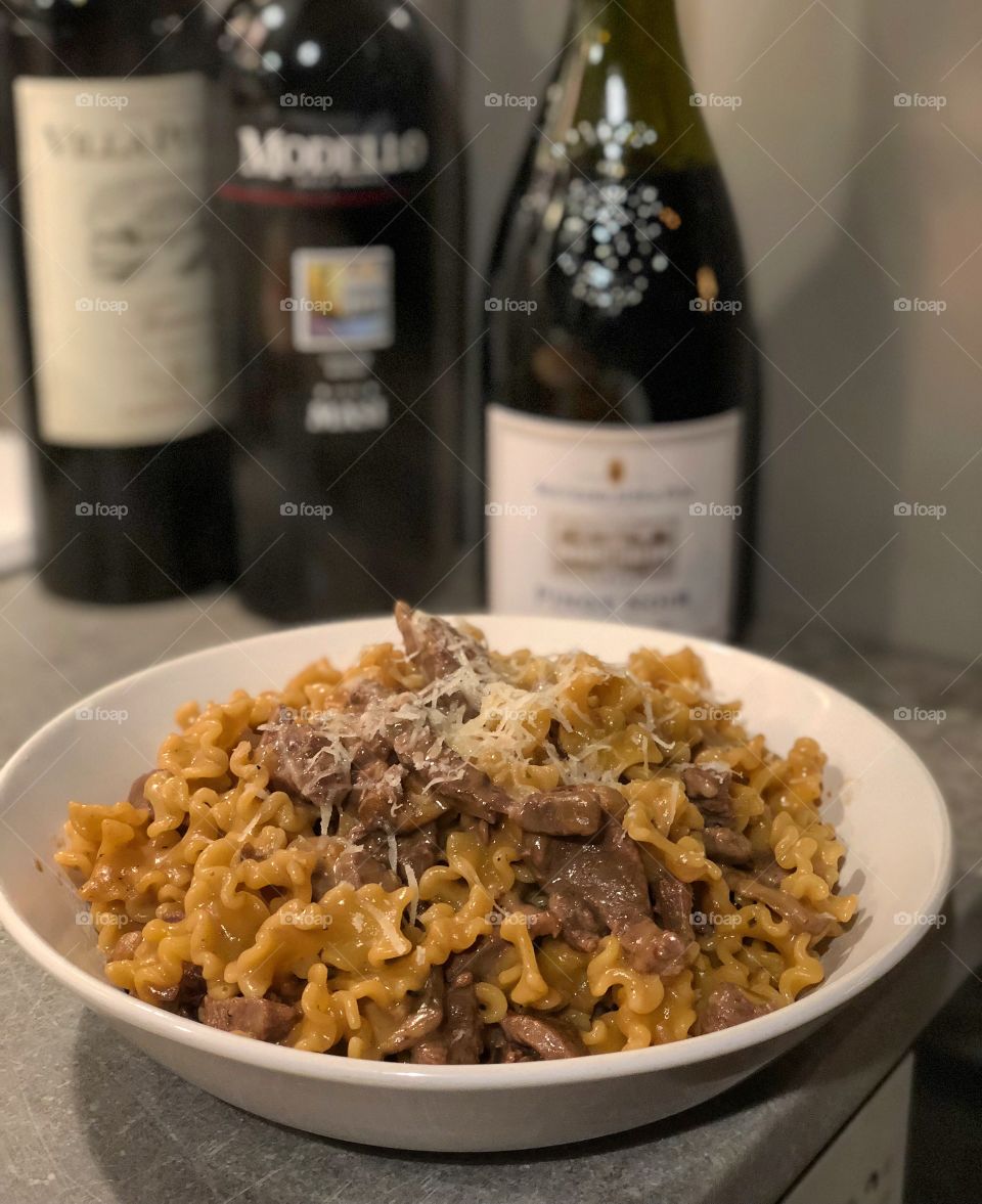 Wonderful tenderloin pasta cooked with red wine, parmesan and some mushrooms