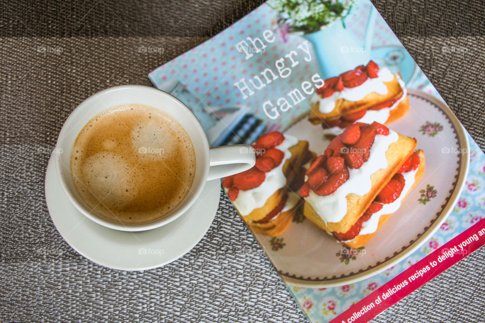 cup of coffee and a recipe book