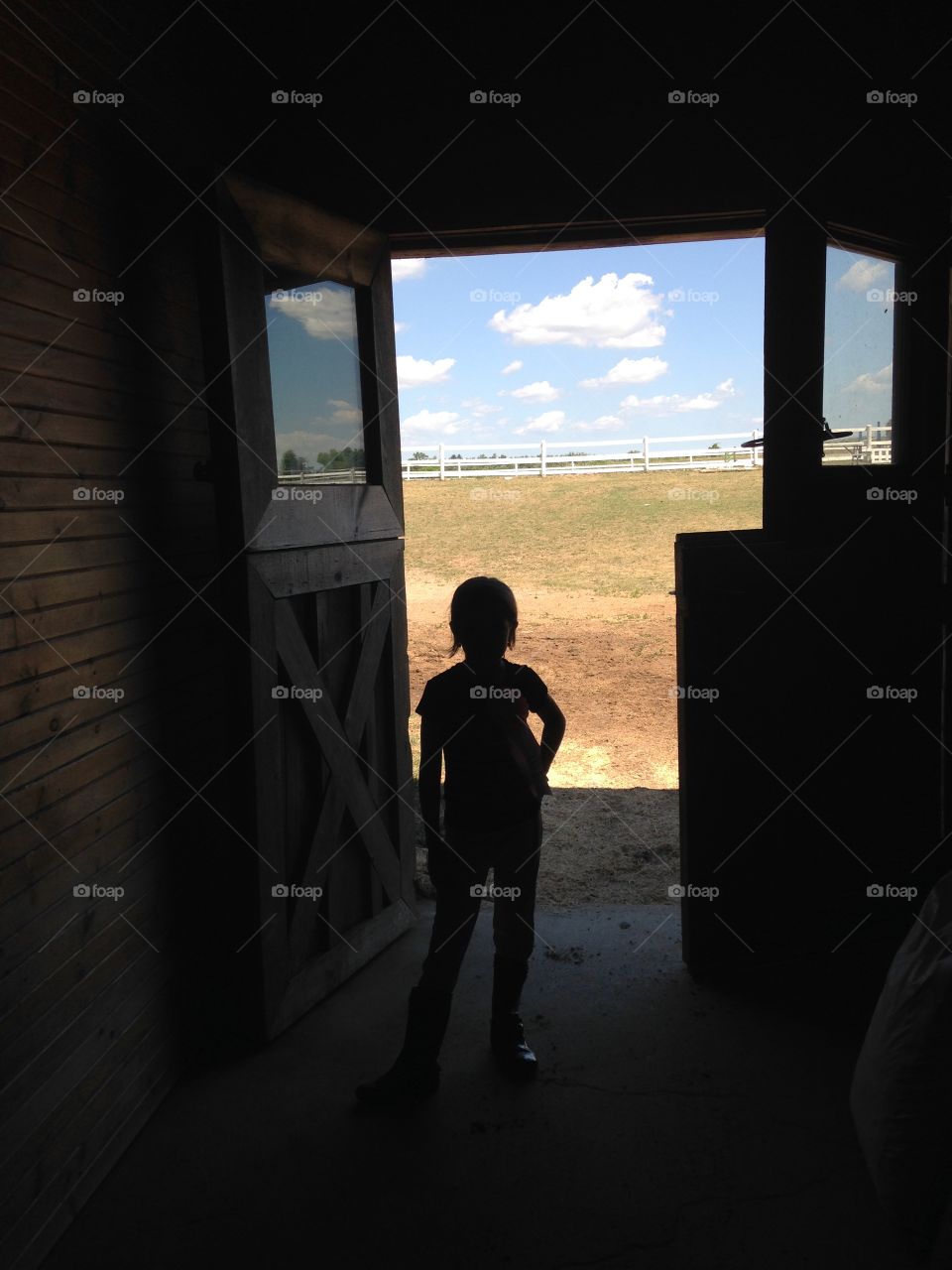 Girl in barn