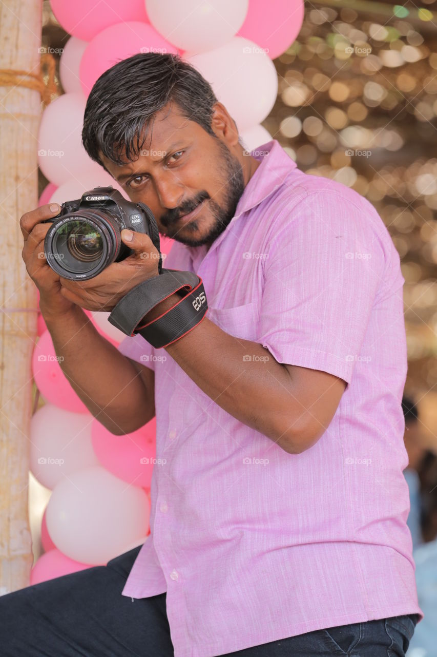 camera man,man,camera, pink
