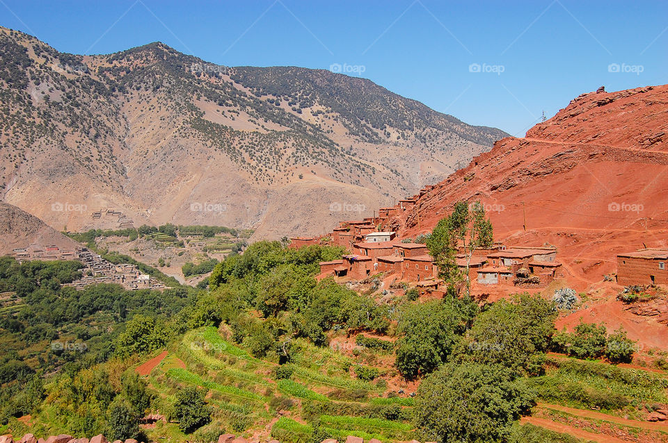 Village in High Atlas, Morocco . And some terraced fields