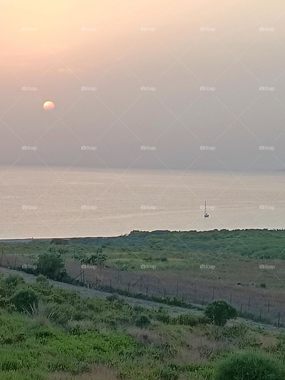 tramonto mare e barca