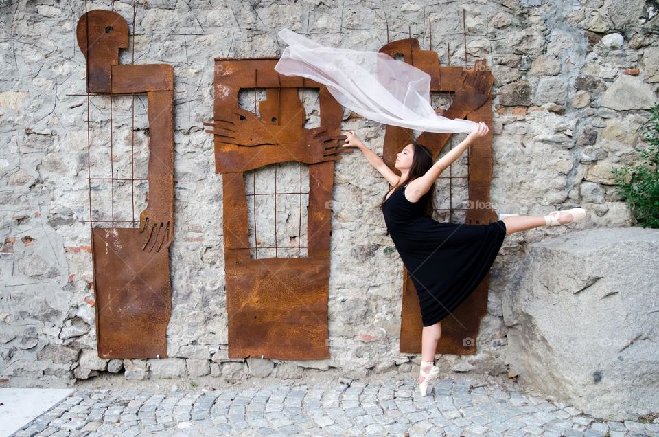 Young Female Ballerina Dancing with a Scarf Outside