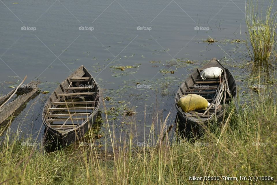 Villagers fishing boat