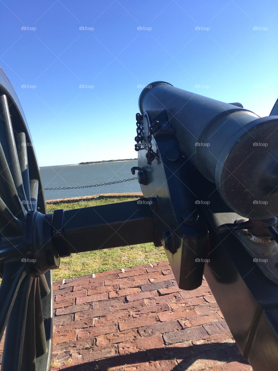Cannon at Fort Sumter during the daytime. Charleston, South Carolina. Charleston Bay.