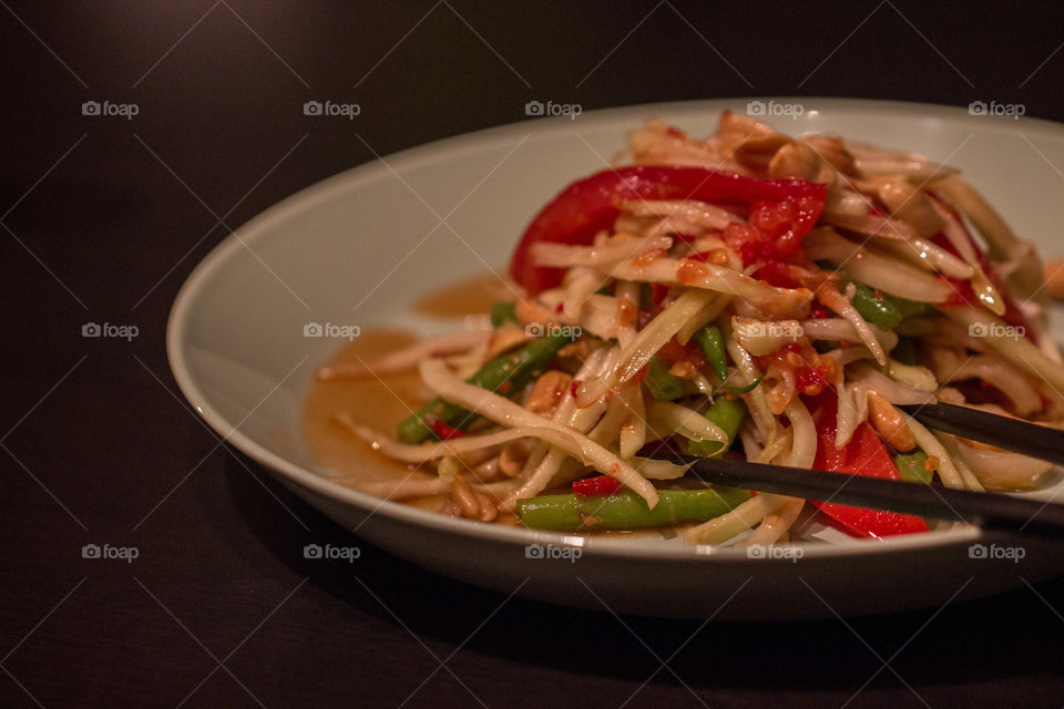 Close-up of som tam in plate