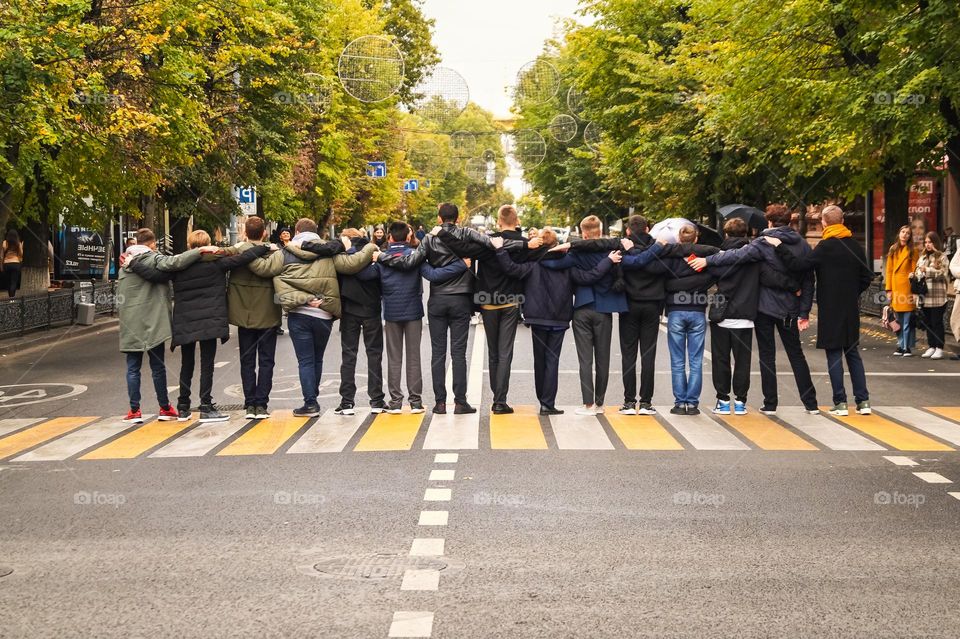 The guys take a photo in honor of unity and friendship.