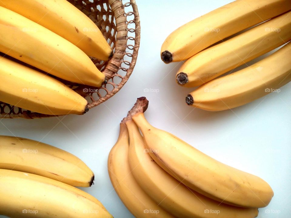 Yellow bananas on white background