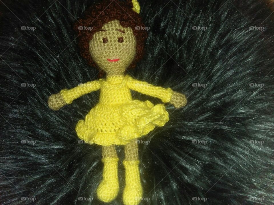 Beautiful yellow girl doll.