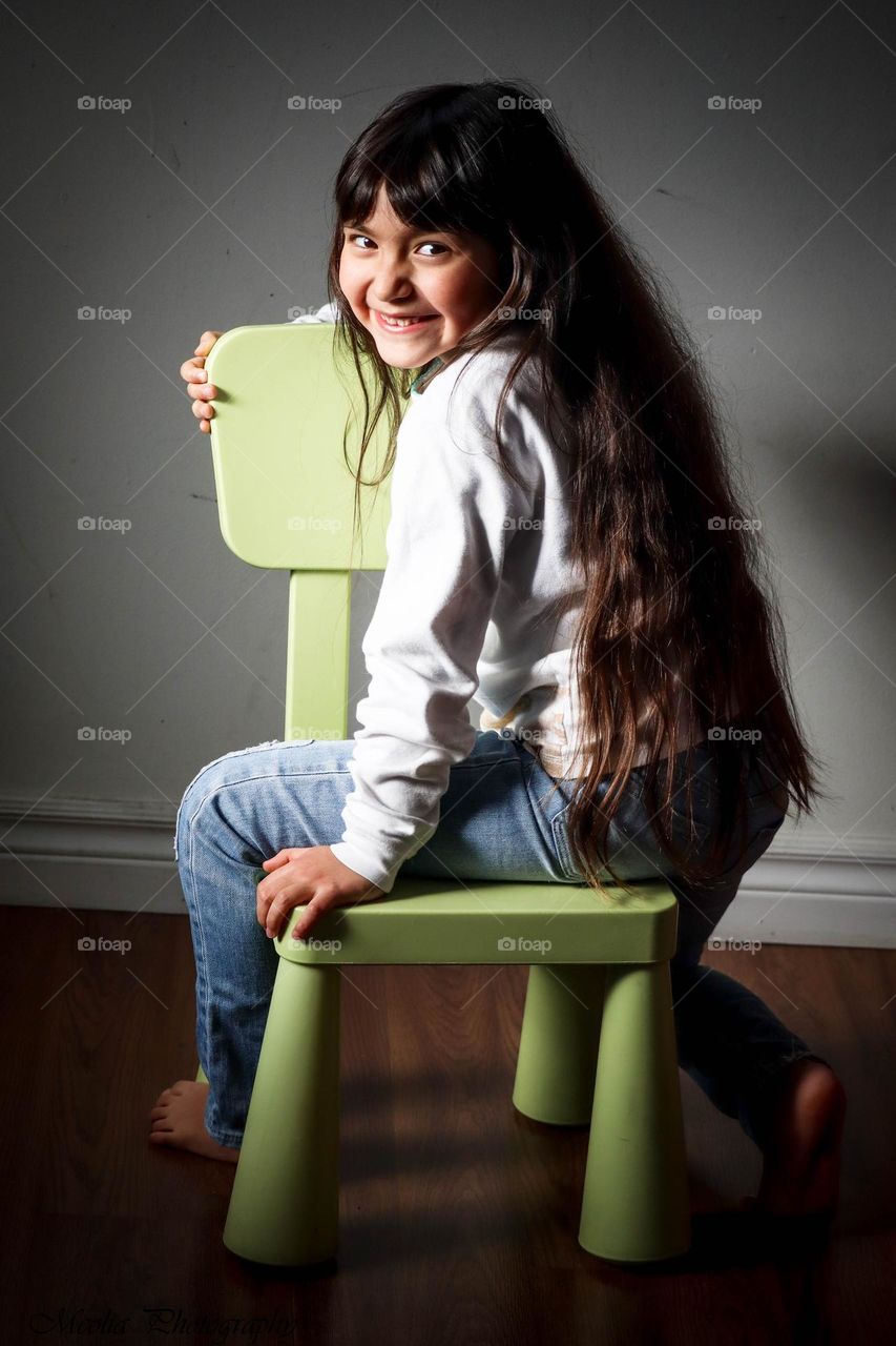 Portrait of a girl with a long hair