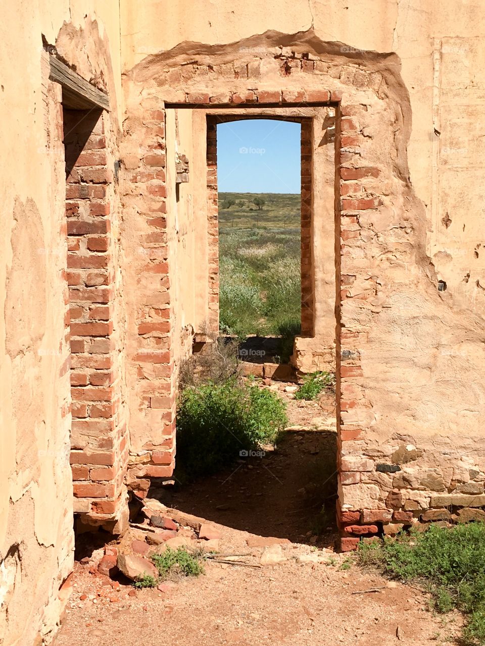 An abandoned old stone colonial house in ruins in the Australian outback near the Flinders Ranges 