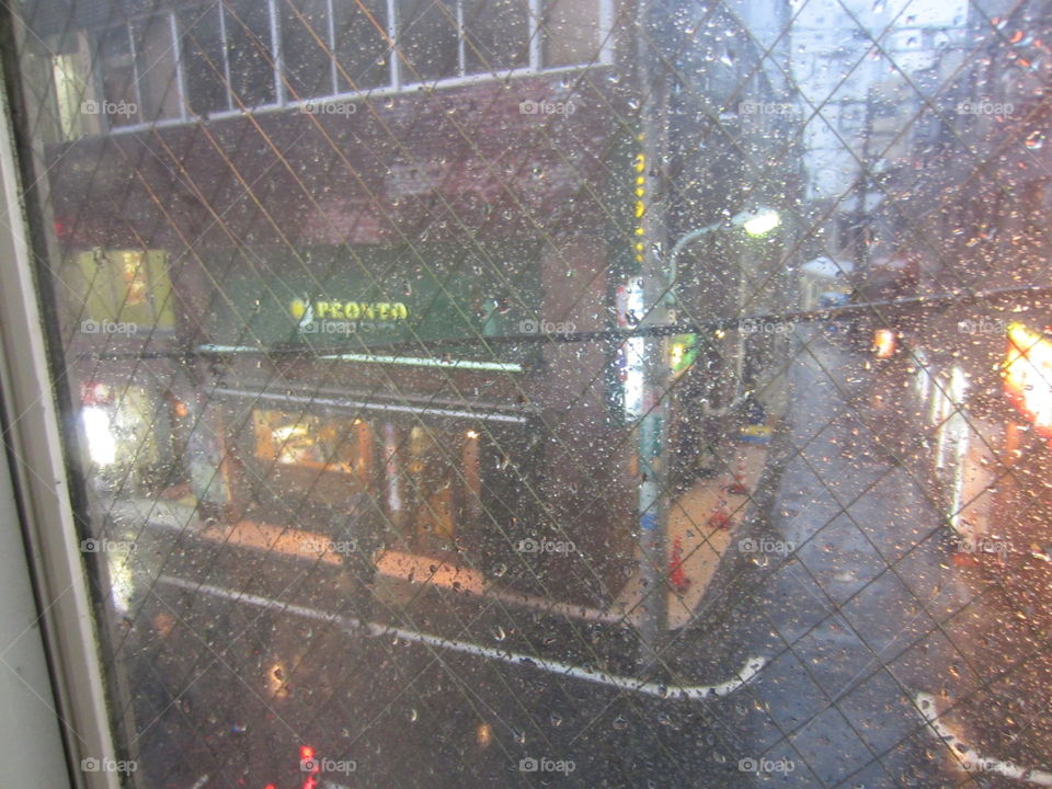 Yoyogi, Tokyo, Japan. Pronto Cafe. View from a Window.  Night Rain and City Lights.