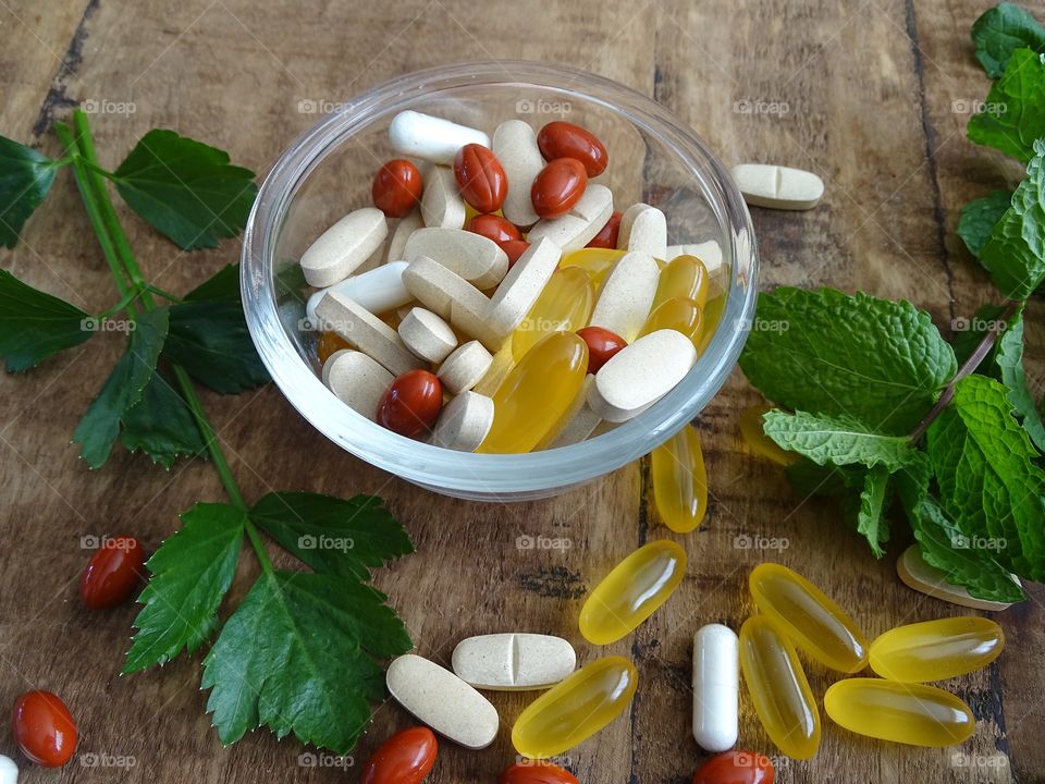 Bowl with pills for a healthy lifestyle