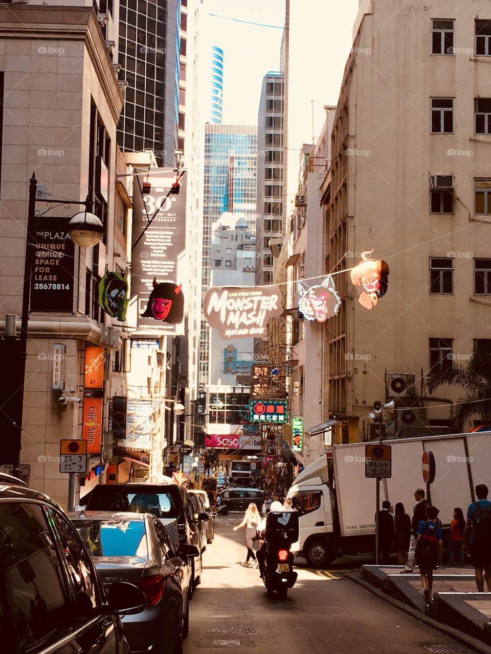 Hong Kong. A City bustling with the newness, business, and money, as well as old, traditional, struggling areas that represent days of old. Loved this eclectic street 