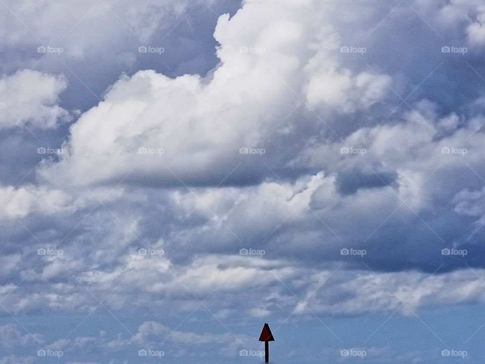 arrow points to the clouds