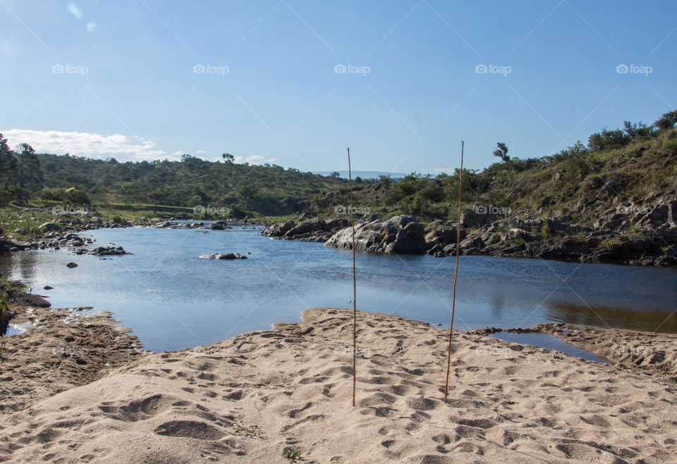 fishing lines on natural river